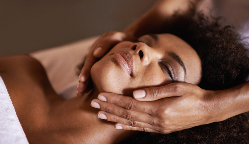 woman enjoying a facial in spa